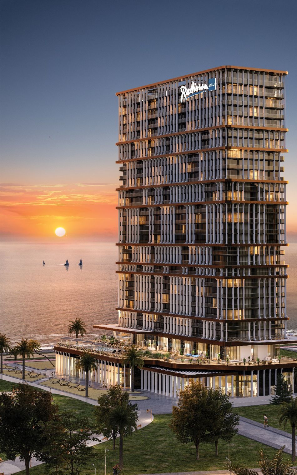 Dusk on the first line; the planted grounds between the tower and the sand.