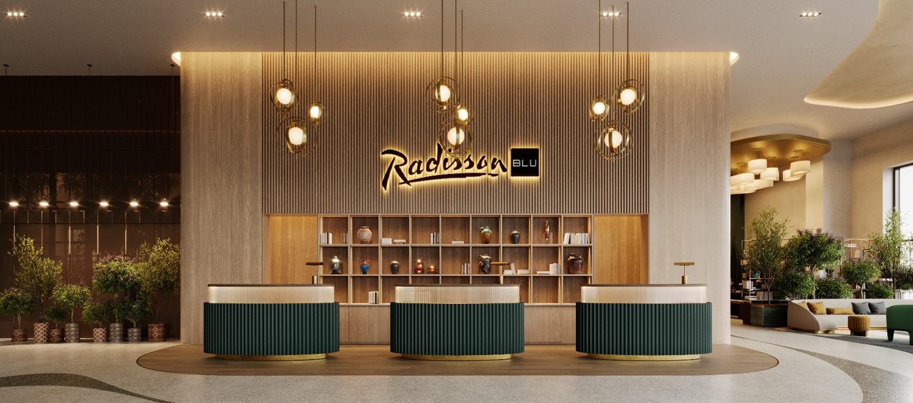 Reception and lobby — the part of the Radisson standard you can actually see.