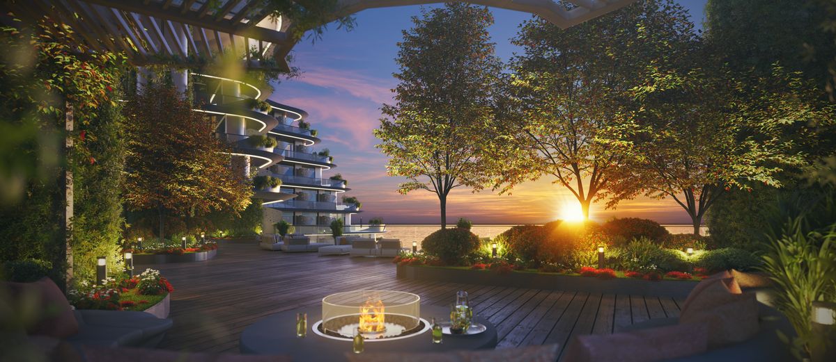 The terraces face the water; the decks sit between the blocks and the private beach.