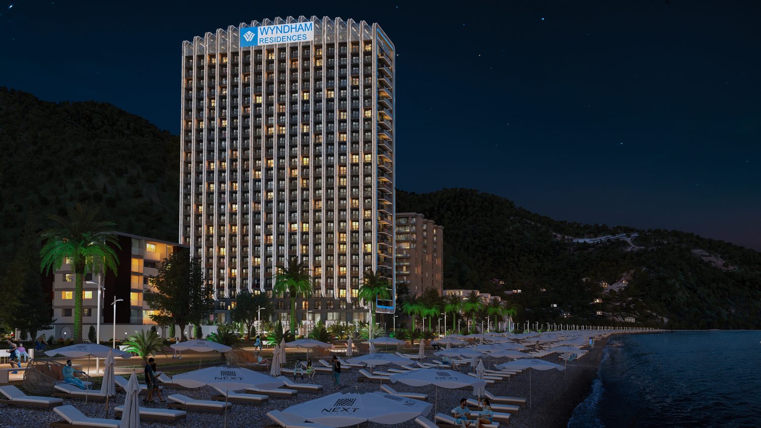 კერძო პლაჟი შენობის წინ და აუზის ტერასა Wyndham-ის ორ კორპუსს შორის.